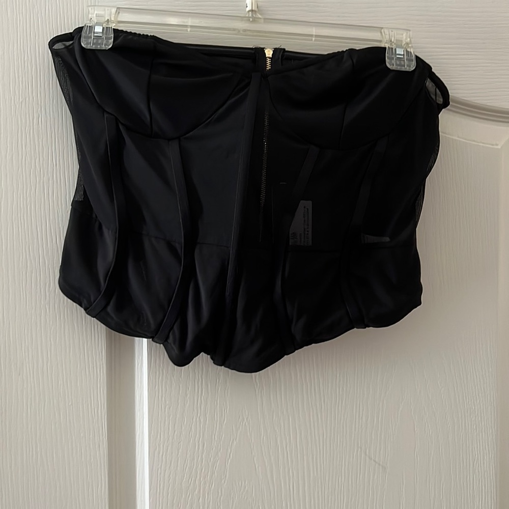 Plus black structured mesh corset longer in front. Sheer in middle section